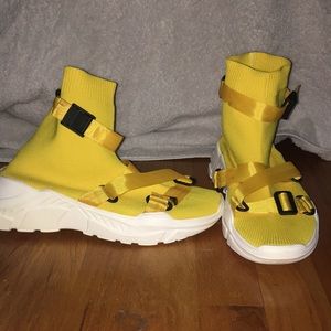 unique yellow buckle sock boots.